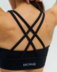 DUNIQ CROSS BACK SPORTS BRA - BLACK - SQOON
