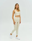 DUNIQ CROSS BACK SPORTS BRA - LIGHT IVORY - SQOON