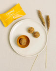 NOMZ ORGANIC HAZELNUT BITES - SQOON