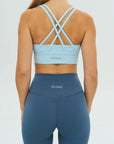 DUNIQ CROSS BACK SPORTS BRA - LIGHT BLUE - SQOON