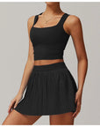 DUNIQ TENNIS & PADEL SKIRT - BLACK - SQOON