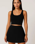 DUNIQ TENNIS & PADEL SKIRT - BLACK - SQOON