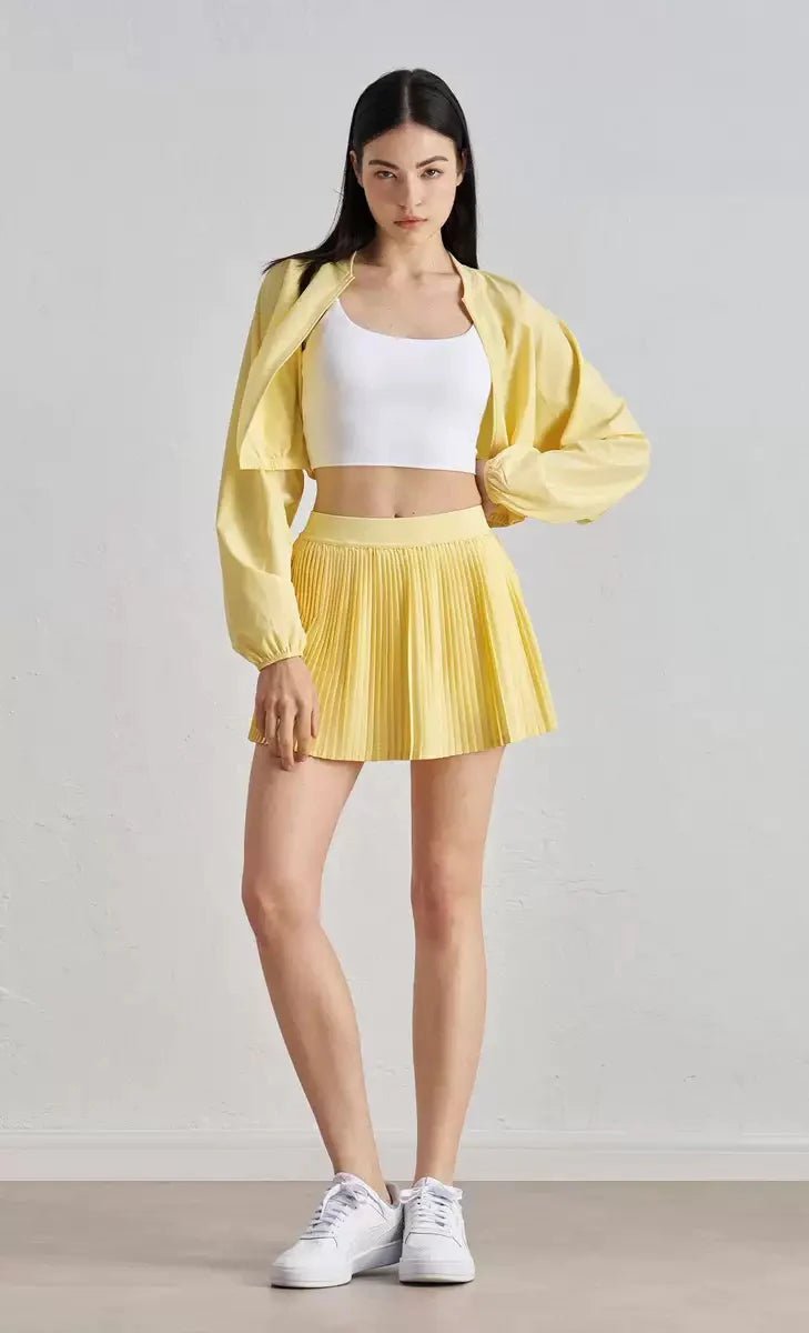 DUNIQ TENNIS & PADEL SKIRT - LIGHT YELLOW - SQOON