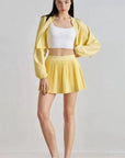 DUNIQ TENNIS & PADEL SKIRT - LIGHT YELLOW - SQOON
